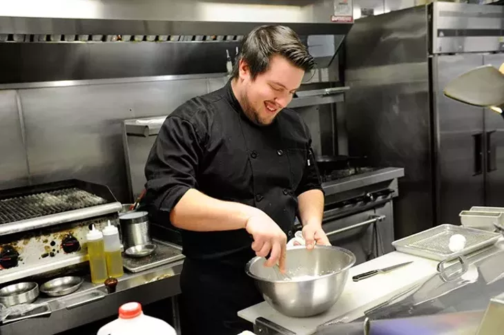 Chef Paul Langer works in the kitchen at Guernsey Park in Oklahoma City, Monday, Jan. 4, 2016. - GARETT FISBECK