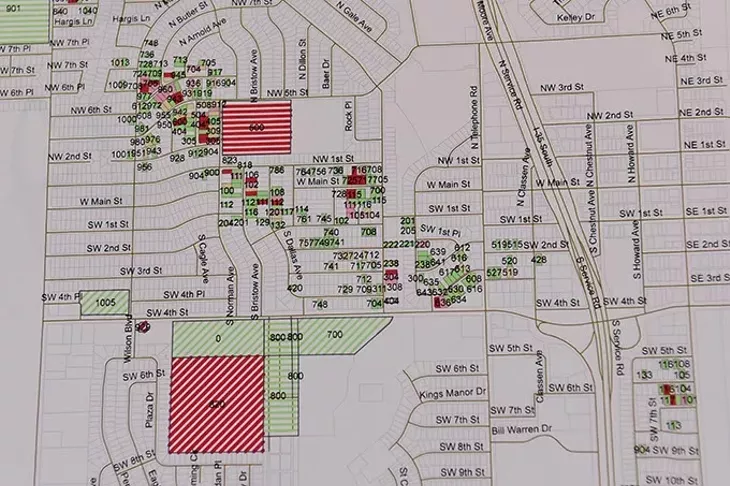 Preliminary damage assesment from Moore's recent March 25th tornado, plotted on a map at the Community Renewal Center. mh
