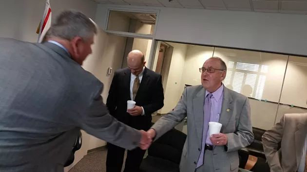 Councilman Pat Ryan, right, retires this month after a 10-year tenure on the OKC council. - BEN FELDER