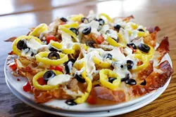 Italian Nachos at Sauced in Oklahoma City, Wednesday, Nov. 18, 2015. - GARETT FISBECK