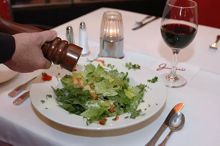 Ceasar salad, prepared tableside, at Junior's. file, 1-23-2009. - SHANNON CORNMAN