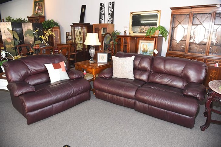 Leather half chair and sofa, at Design to Consign, on North May Avenue in OKC, 11-11-15. - MARK HANCOCK