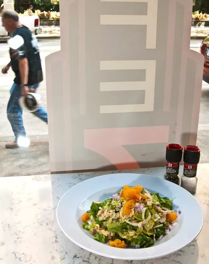 Asian salad by the window decal at Cafe 7 in downtown OKC. (Mark Hancock)