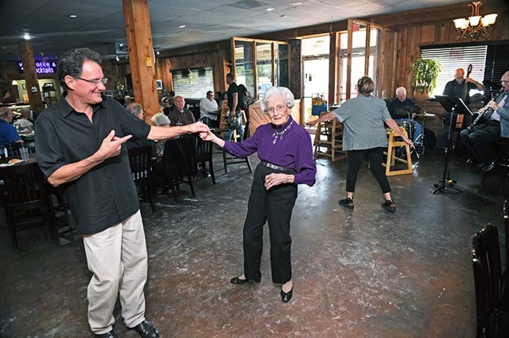 George Camp and Ellen Wheeler dance during a performance at Ingrid's Kitchen by the band The Silvertops, 10-17-15. - MARK HANCOCK