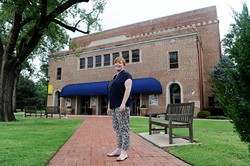 Meghan Braseull, Director of Facilities and Productions for Mitchell Hall, poses for a photo on the University of Central Oklahoma Campus, Tuesday, July 7, 2015. - GARETT FISBECK