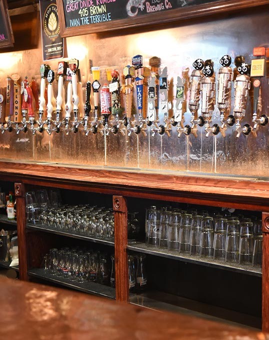 The many taps at Tapwerks in Bricktown, 6-18-2015. - MARK HANCOCK