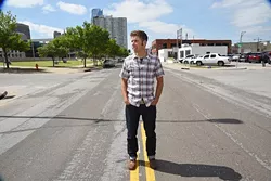 Chad Hodges, Pro-Am race director, on Hudson Avenue, just north of the race course. mh
