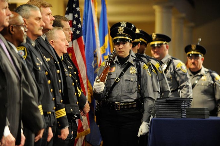 Posting of the Colors by the Oklahoma City Police Honor Guard during the Oklahoma City Police Academy Recruit Class 132 graduation at First United Methodist Church, Thursday, Dec. 4, 2014. - GARETT FISBECK
