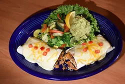 Chicken Burrito with quacamole and veggies, at Hidalgo's Cocina & Cantina in Edmond, Oklahoma, 1-19-16. - MARK HANCOCK