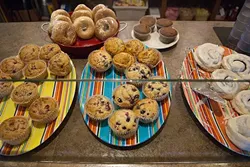 Muffins and other baked goodies are available near the cash register for walk-in customers. (Mark Hancock)