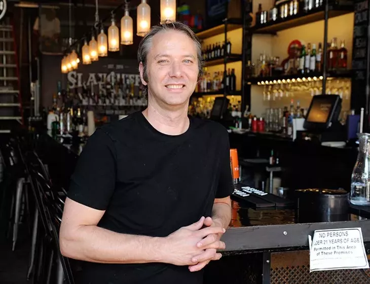 Chef Jonathan Groth, new executive chef of Slaughter's Hall and WKSY Lounge, poses for a photo in Oklahoma City, Monday, Sept. 14, 2015. - GARETT FISBECK