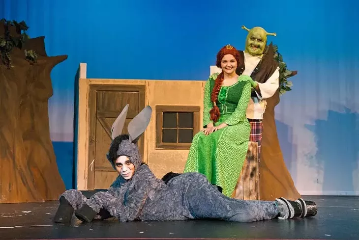 Kylie Anderson plays Donkey, Sarah Royse plays Fiona and Boston Cervantes plays Shrek in Sooner Theatre's presentation of Shrek The Musical. mh