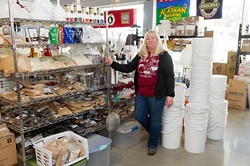 Gail White poses for a photo at the Brew Shop in Oklahoma City, Tuesday, Feb. 16, 2016. - GARETT FISBECK