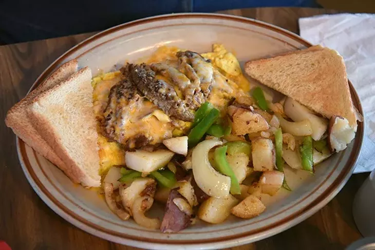 Chelio's everything omelette with home fries. mh