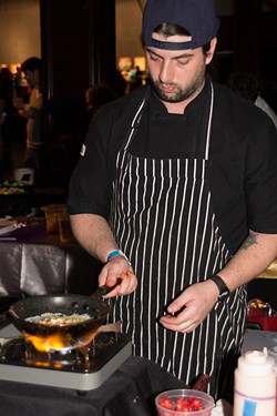 Chef Henry&nbsp;Boudreaux from the Museum&nbsp;Cafe&nbsp;preparing an Omelette, 2014. - A. GILILLAND