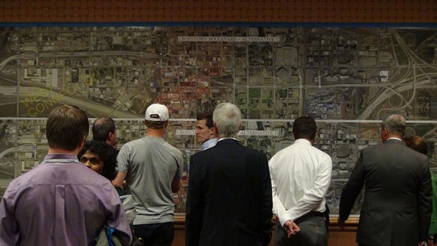 Residents mull proposed Crosstown Boulevard plans in last week's public meeting. Photo by Ben Felder. - BEN FELDER
