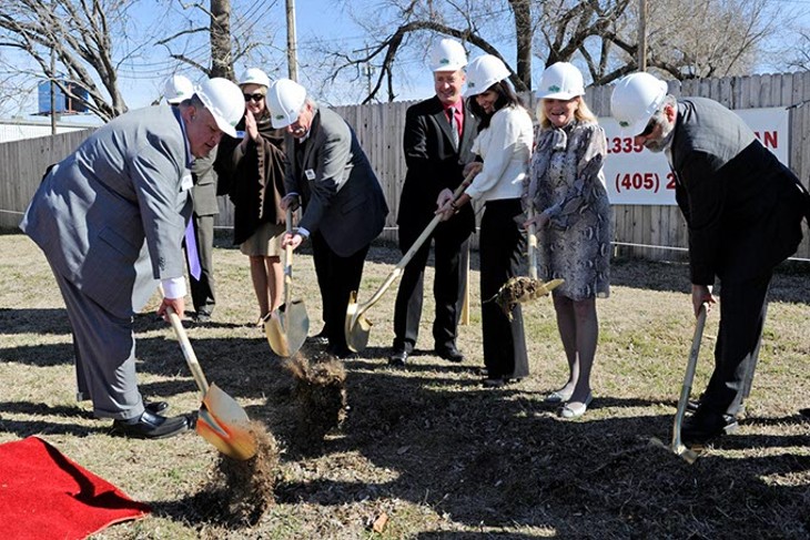 Dignitaries break ground during a groundbreaking ceremony at the Jesus House in Oklahoma City, Friday, Feb. 13, 2015. - GARETT FISBECK