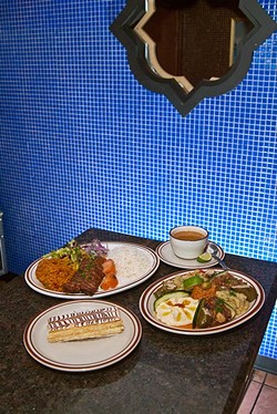Clockwise from upper left, Adana kebab, mille-feuille dessert, the Istanbul Sampler, and a cup of Lentil soup, at Istanbul Turkish Cuisine restaurant. (Mark Hancock)