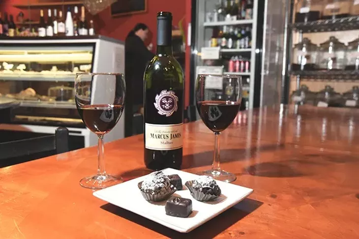 Wine and chocolate make for a romantic get together, at Michaelangelo's Coffee and Wine in Norman, 1-21-16. - MARK HANCOCK