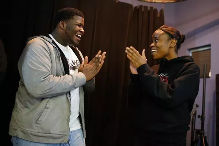 Denzel Graves and Malaysia Glover sing in music class at Seeworth Academy in Oklahoma City, Friday, April 24, 2015. - GARETT FISBECK