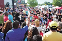 A dancing crowd at Plaza Fest 2013
