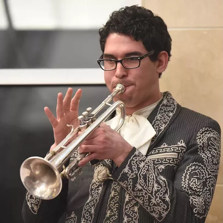 A trumpeter in the Mariachi Orgullo de America band performing at Plaza Major at the Crossroads recently. mh