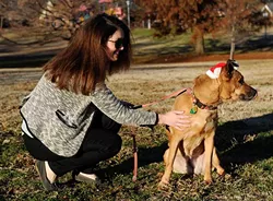 Allison Peterson walks Cabella at Flower Garden Park in Oklahoma City, Wednesday, Dec. 16, 2015. - GARETT FISBECK