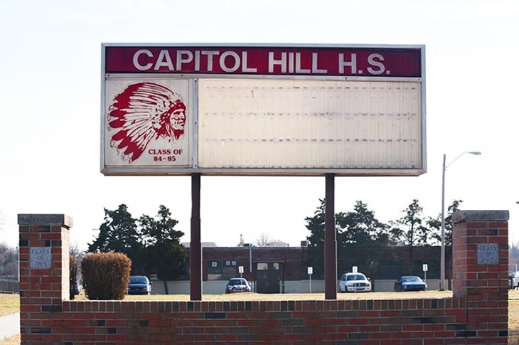This Capitol Hill High School marquee with the Redskins artwork stands in the corner of the front lawn of the high school located at 500 SW 36th Street.  mh