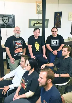 From left, OKC Film Club organizers, Patrick Crain, Eric King, and Alex Palmer, in back with a crowd ready for the start of a horror film at District House in the Plaza District, 10-14-15. - MARK HANCOCK