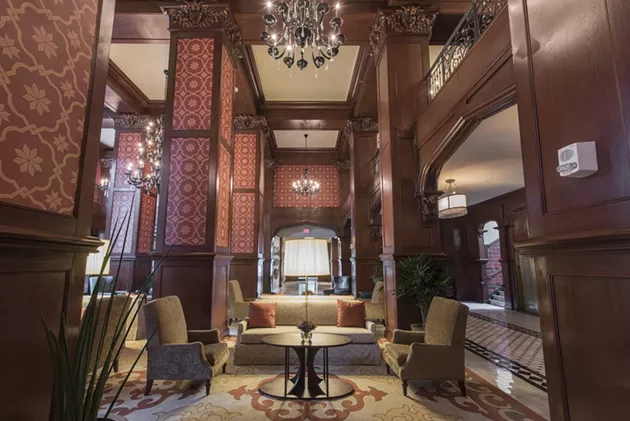 New soft goods — carpet, wallpaper and cushions — transformed The Skirvin Hilton’s lobby into a popular, comfortable guest area. | Photo The Skirvin Hilton / provided