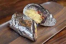 Breakfast burrito with scrambled eggs, pico de gallo, refried black beans, rice and Jack cheese (Garett Fisbeck)