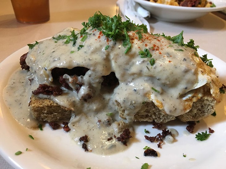 The Red Cup&#146;s gluten-free biscuit and gravy is topped with plant-based sausage and vegetable gravy. | Photo Jacob Threadgill