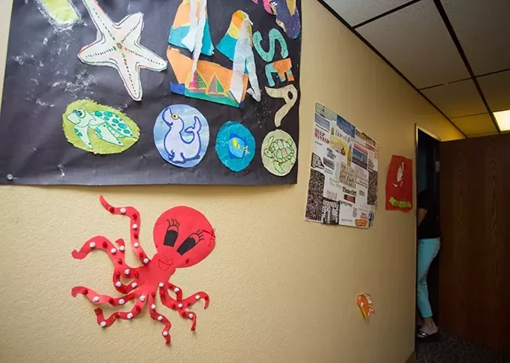 Therapy artwork hangs on a wall in a hallway of Gateway Prevention and Recovery on Wednesday, June 29, 2016 in Shawnee, Oklahoma. - EMMY VERDIN