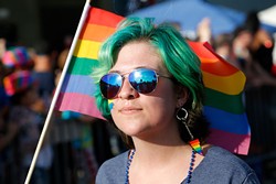 Vaunda Knapp marches during the 2015 OKC Pride Parade. OKC Pride&#146;s theme for 2017 is &#147;30 years of resistance.&#148; The nonprofit organization is celebrating 30 years of Pride celebrations this year. - GARETT FISBECK / FILE