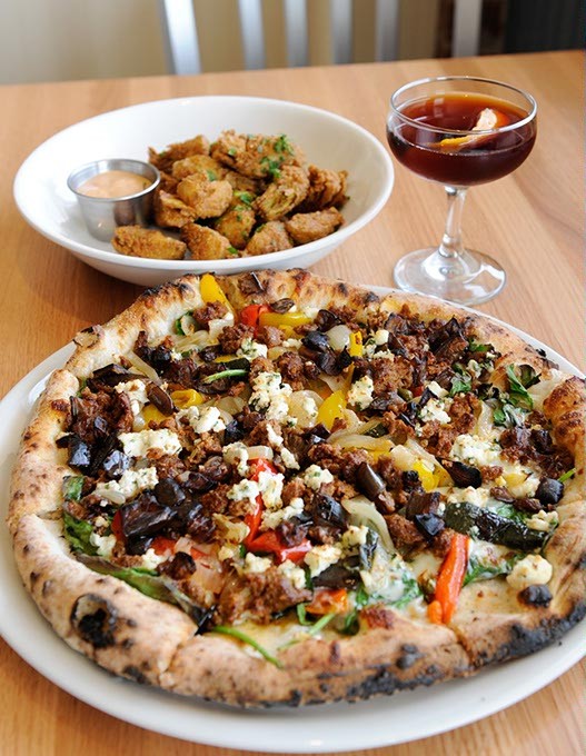 Lamb sausage pizza, fried artichoke hearts, and a Antiquato cocktail at Pizzeria Gusto in Oklahoma City, Wednesday, Jan. 28, 2015. - GARETT FISBECK