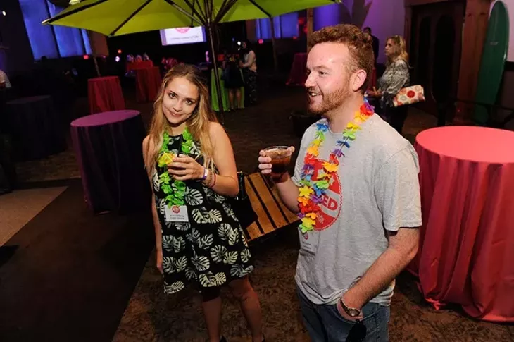 Anna Shilling and Ben Luschen get … leis.