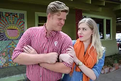 Forrest Bennett, an OU grad, and his partner, OSU alum Meg McElhaney, still love each other despite their interschool rivalry. (Mark Hancock / for Oklahoma Gazette)