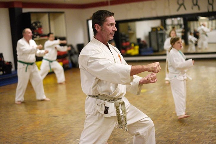 Chris Fay teaches a class at Okinawa Karate School. (Garett Fisbeck)