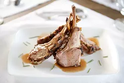 Duroc pork chops at Meat Market Refectory, Wednesday, July 6, 2016. - GARETT FISBECK