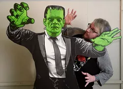 Art Sunday poses for a photo with Frankenstein's monster to promote the Underground Monster Carnival, Tuesday, Feb. 7, 2017. - GARETT FISBECK