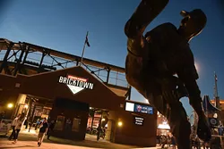 Fans filter in and out of the Chickasaw Bricktown Ballpark during the season opener with the OKC Dogers vs Round Rock Express, 4-9-15. mh
