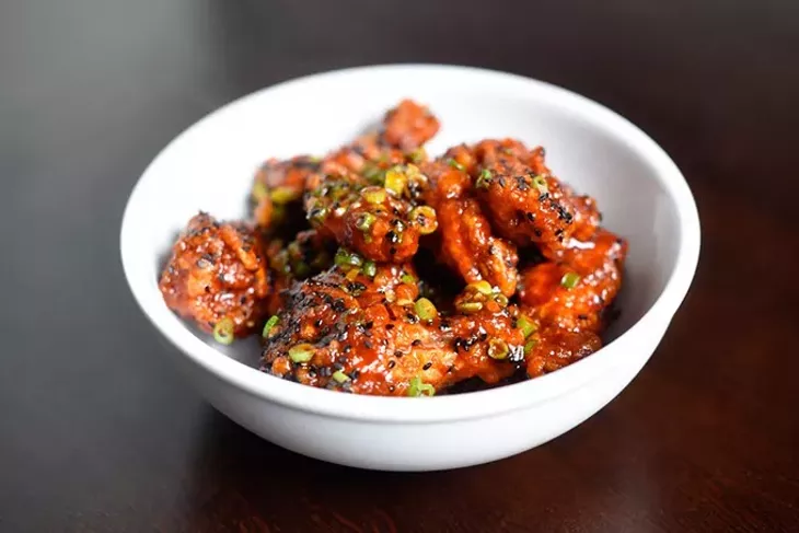 Gochujang wings for Paul Langer's new concept Chicken & Beer, Tuesday, May 17, 2016. - GARETT FISBECK