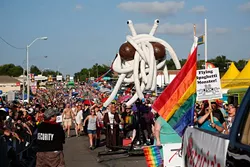 Twisted Armani jumps over Lita-Lita Ho' Beta and Princess Mayhem during 2015 OKC Pride Parade. OKC Pride’s theme for 2017 is “30 years of resistance.” The nonprofit organization is celebrating 30 years of Pride celebrations this year. (Garett Fisbeck / file)