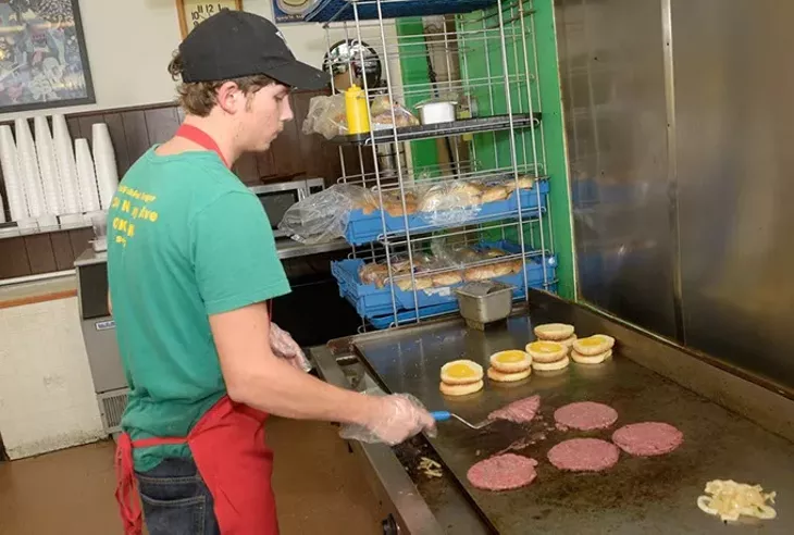 Michael Scott works the grill at Barry’s. | Photo Garett Fisbeck