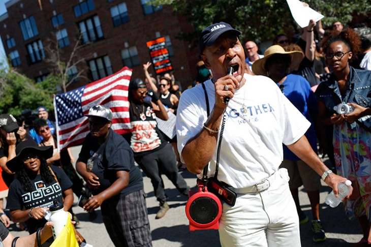 Garland Pruitt, president of the NAACP Oklahoma City branch, addresses a crowd during a Black Lives Matter demonstration in Oklahoma City, Sunday, July 10, 2016. - GARETT FISBECK