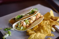 Soft chicken taco at Tacoville, Tuesday, April 26, 2016. - GARETT FISBECK