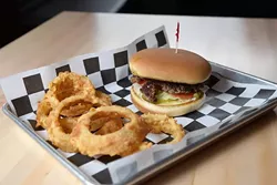 Buffalo Nickel Burger with onion rings at 1907 Burgers & Brews in Moore, Friday, Sept. 23, 2016. - GARETT FISBECK