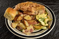 Pork chop dinner with home fries at Aja Bleu Cafe in Oklahoma City, Wednesday, Oct. 19, 2016. - GARETT FISBECK