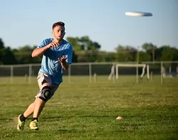Clark Reimer catches a disc during a recent Ultimate Frisbee practice. | Photo Garett Fisbeck