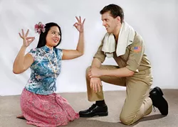 Hannah Descartin uses hand movements to sing "Happy Talk" to Jeremy Small in this publicity photo for Jewel Box Theatre's production of "South Pacific," the theatre's final show of this season. Photo by Jim Beckel, The Oklahoman - JIM BECKEL, THE OKLAHOMAN